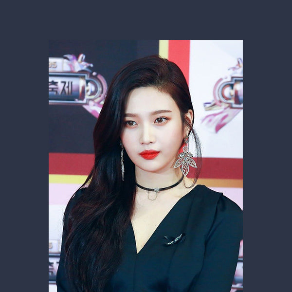 Joy, member of Red Velvet, K-pop idol girl group, with hits such as Russian Roulette and Dumb Dumb. Her long, side-swept hair in their 'Bad Boy' album is a great look for round faces.
